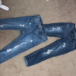 Two pairs of ripped Hollister boyfriend jeans